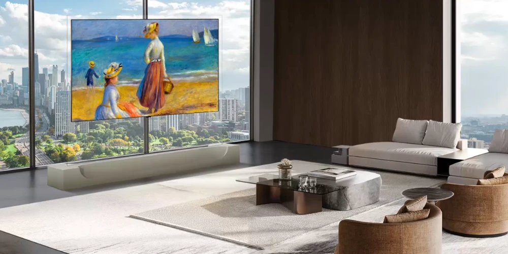 LG OLED83W69LA installé dans un salon face à une baie vitrée, écran affichant une œuvre d'art