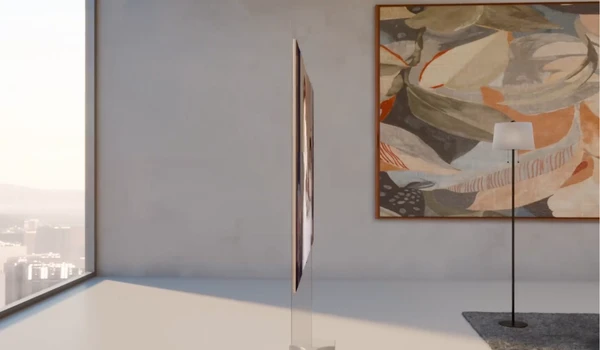 Vue de profil du LG OLED83W69LA montrant l'épaisseur très fine de la dalle OLED sur pied