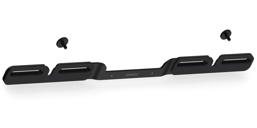 Support mural Sonos Beam Ultra noir en vue large, avec ses quatre fentes de fixation et les deux vis fournies posées à côté.